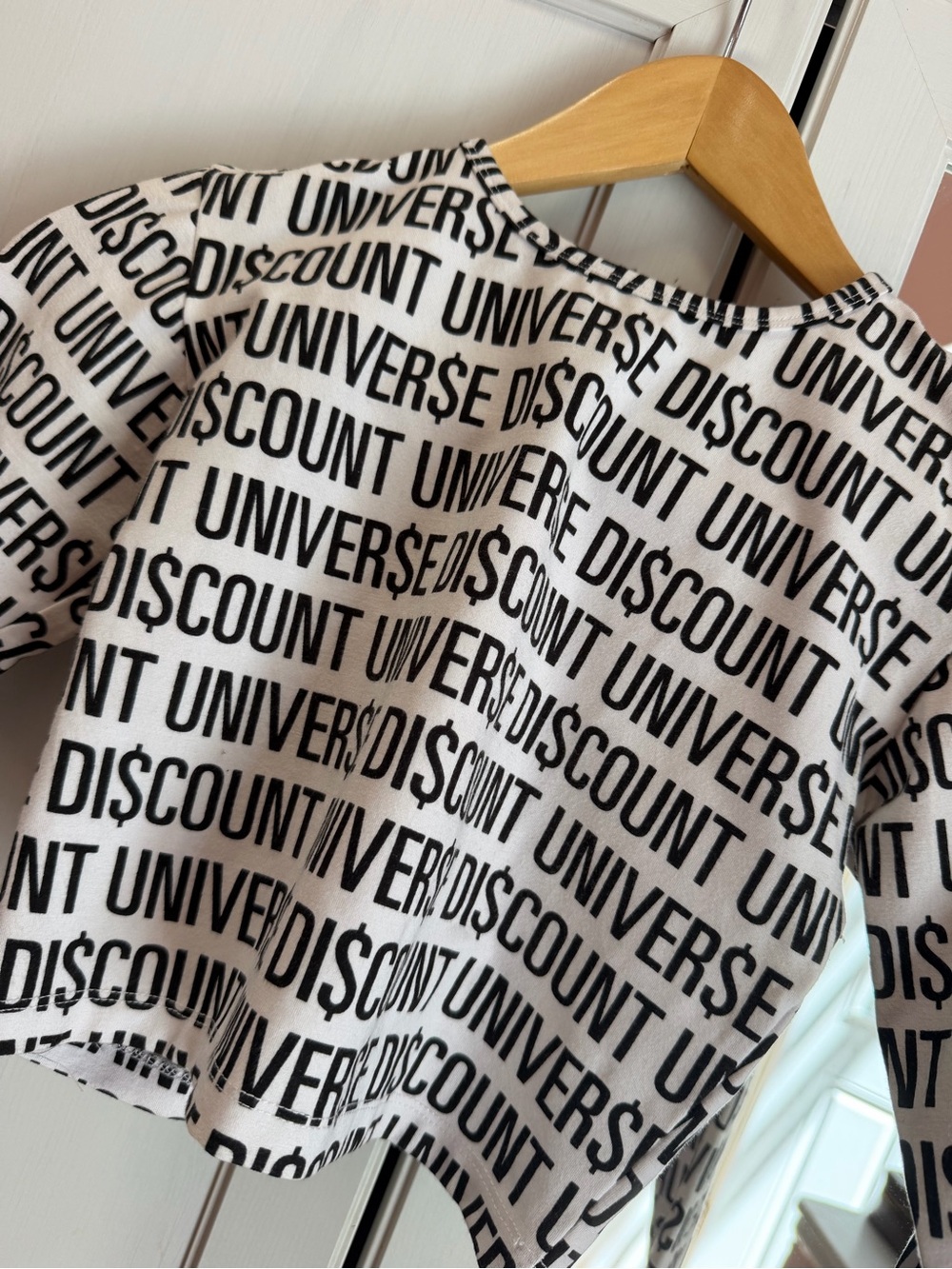 Discount Universe Black & White Logo Zip-Back Crop Top - Size Medium